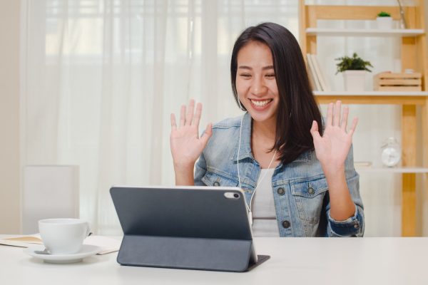 freelance-business-women-casual-wear-using-tablet-working-call-video-conference-with-customer-workplace-living-room-home-happy-young-asian-girl-relax-sitting-desk-job-internet